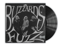 Charger l'image dans la galerie, Vinyl record with cover titled 'Blizzards of Fuzz' featuring three figures in bird masks.
