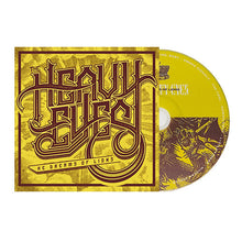 Load image into Gallery viewer, The Heavy Eyes - He Dreams Of Lions compact disc and album cover with yellow and brown design featuring text and a logo.