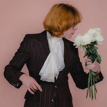 Load image into Gallery viewer, Person holding a bouquet of white flowers against a pink background