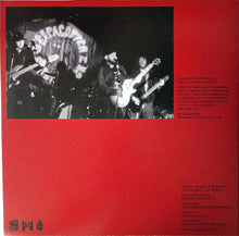 Load image into Gallery viewer, Back cover of a vinyl record with a band performing and text on a red background