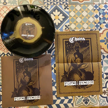 Cargar imagen en el visor de la galería, Vinyl record and its cover on a patterned surface