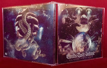 Load image into Gallery viewer, CD case with intricate artwork including a hand holding a snake and a globe.