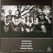 Load image into Gallery viewer, Black and white photo of four men sitting outdoors with album cover text below