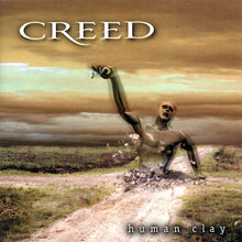 Cargar imagen en el visor de la galería, Creed - Human Clay front compact disc cover artwork.
