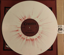 Load image into Gallery viewer, Vinyl record with a red and white design on a cardboard surface