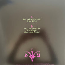 Charger l'image dans la galerie, Album cover with text and a logo on a dark background