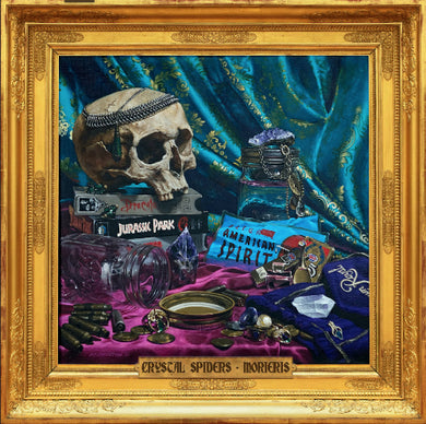 Album cover art featuring a skull with a crown of thorns on top, surrounded by a turquoise fabric with the text 'CRYSTAL SPIDERS - MORIERIS'.