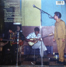 Charger l'image dans la galerie, Back cover of a music album with band members playing instruments and singing.