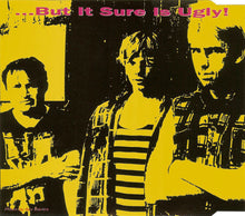 Charger l'image dans la galerie, Stylized portrait of three individuals with text 'But It Sure Is Ugly!' on a yellow background