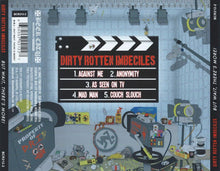 Cargar imagen en el visor de la galería, Album cover for 'Dirty Rotten Imbeciles' with a clapperboard and studio setup.