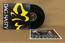 Load image into Gallery viewer, Vinyl record with yellow and black design and 'Dag Nasty' branding on a brown background.