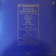 Cargar imagen en el visor de la galería, Vinyl record cover with gold text on a blue background