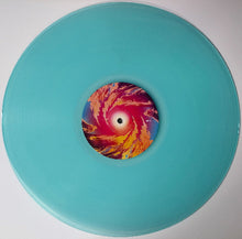 Charger l'image dans la galerie, Turquoise vinyl record with a colorful center on a white background