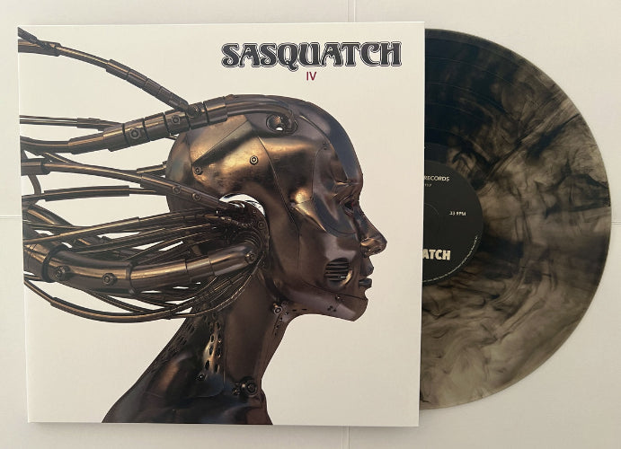 Vinyl record with a metallic sculpture and 'Sasquatch' album cover