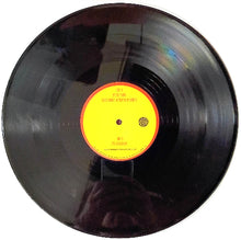 Cargar imagen en el visor de la galería, Vinyl record with a yellow label on a white background