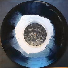 Load image into Gallery viewer, Vinyl record with a white center and black edges on a dark surface