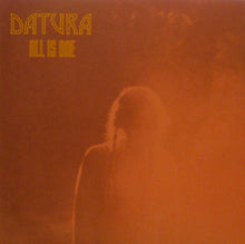 Cargar imagen en el visor de la galería, Album cover with 'Datura' text and a silhouette of a person in orange tones