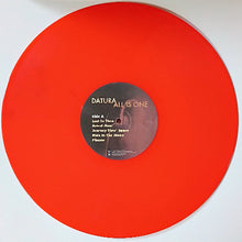 Cargar imagen en el visor de la galería, Red vinyl record with a label on a white background