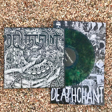 Charger l'image dans la galerie, Vinyl record with black and white cover and green disc on a gravel surface