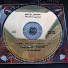 Cargar imagen en el visor de la galería, CD with 'Defecation' album cover featuring a red and black design.
