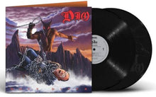 Cargar imagen en el visor de la galería, The album cover features a colorful illustration. It shows a figure with a devilish appearance, holding a chain, and pointing towards the sky.