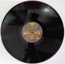 Cargar imagen en el visor de la galería, Vinyl record with a label featuring a ram&#39;s head design on a white background