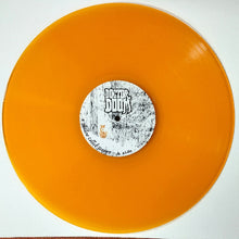 Cargar imagen en el visor de la galería, Orange vinyl record with a label on a white background