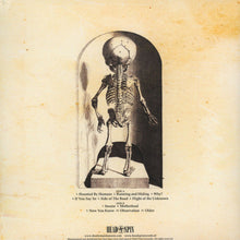 Load image into Gallery viewer, Skeletal figure in a glass case on a vintage-style album cover with text and branding.