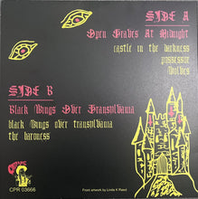 Charger l'image dans la galerie, Vinyl record cover with text and castle illustration on a black background
