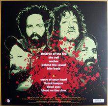 Cargar imagen en el visor de la galería, Album cover with four faces and red splatter design on a black background