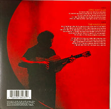 Charger l'image dans la galerie, Album cover with silhouette of a person playing guitar against a red background