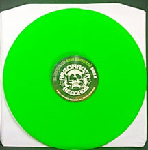 Load image into Gallery viewer, Green vinyl record with a label on a white background