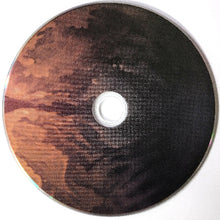 Load image into Gallery viewer, Round fabric disc with a white button in the center on a white background