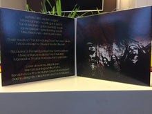 Load image into Gallery viewer, Open book with text and black and white photo on a light surface