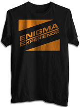 Cargar imagen en el visor de la galería, Black t-shirt with 'Enigma Experience' text in gold on a white background