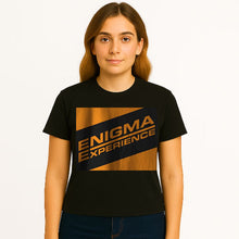 Cargar imagen en el visor de la galería, Person wearing a black t-shirt with 'Enigma Experience' design on a white background