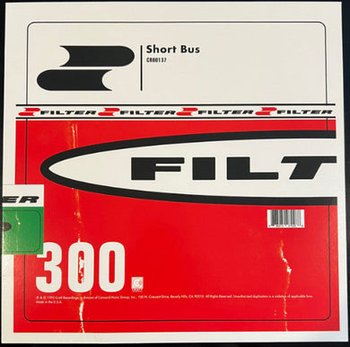 Album cover with 'FILT' branding and text on a red and white background