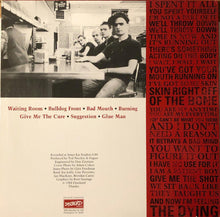 Cargar imagen en el visor de la galería, Album cover with a black and white photo of people in a waiting room, text on the right side, and Discworld logo at the bottom.