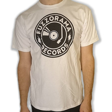 A man wearing a white T-shirt with 'FUZZORAMA RECORDS' text and a record graphic on it.