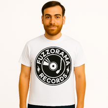 Load image into Gallery viewer, Man wearing a white t-shirt with Fuzzorama Records logo on a white background
