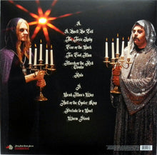 Charger l'image dans la galerie, Two people holding candelabras with a dark background and text