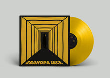 Charger l'image dans la galerie, A vinyl record partially pulled from its sleeve, showing a bright yellow disc and a matching yellow-and-black album cover with the title 'GRANDPA JACK' at the bottom, on a light gray background.