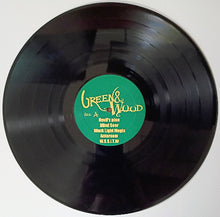 Charger l'image dans la galerie, Vinyl record with a green label on a white background