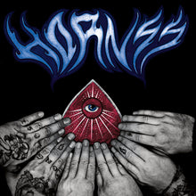 Cargar imagen en el visor de la galería, Red triangle with eye design held by tattooed hands against a black background with blue flame-like shapes.