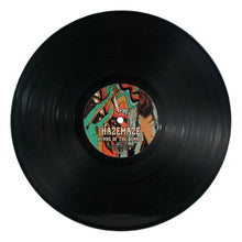 Charger l'image dans la galerie, Vinyl record with a colorful label on a white background