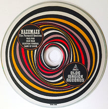 Load image into Gallery viewer, Disc with colorful spiral design and text on a white background