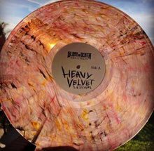 Cargar imagen en el visor de la galería, Vinyl record with 'Heavy Velvet Sessions' label against a natural background