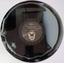 Load image into Gallery viewer, Vinyl record with a face illustration on the label against a white background
