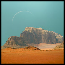Charger l'image dans la galerie, Desert landscape with large rock formation under a clear blue sky