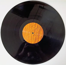 Charger l'image dans la galerie, Vinyl record with a wooden center on a white background